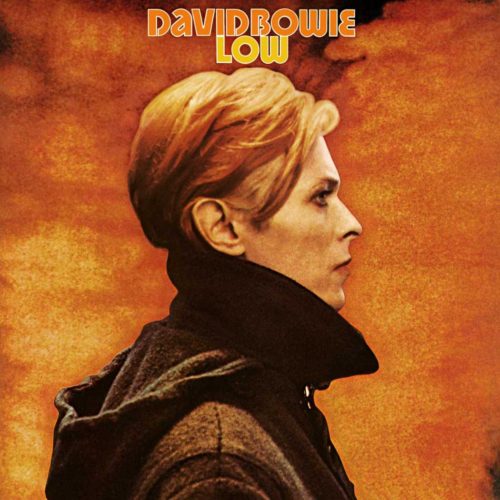 David Bowie album cover titled "Low," featuring a black and orange photo of Bowie with a stoic expression.